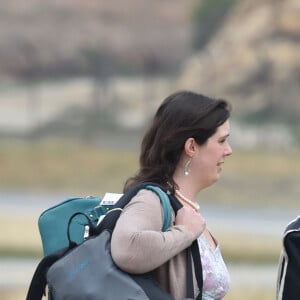 Natasha Archer, la styliste de la duchesse, Rebecca Deacon, secrétaire particulière de la duchesse et Sophie Agnew, assistante de la secrétaire particulière de la duchesse - Le personnel du prince William et de Kate Middleton à son arrivée à l'aéroport de Paro au Bhoutan 14 avril 2016.
