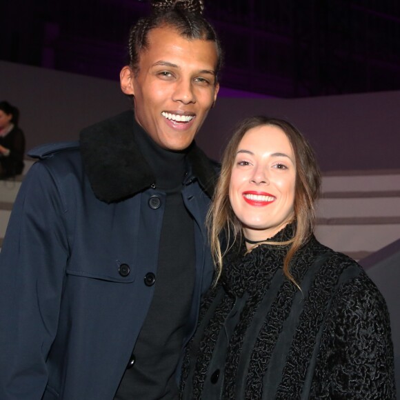 Naissance - Stromae est papa d'un petit garçon pour la première fois - Stromae (nouvelle coupe de cheveux) et sa femme Coralie Barbier au défilé "Victoria's Secret Paris 2016" au Grand Palais à Paris, le 30 novembre 2016. © Denis Guignebourg/Bestimage