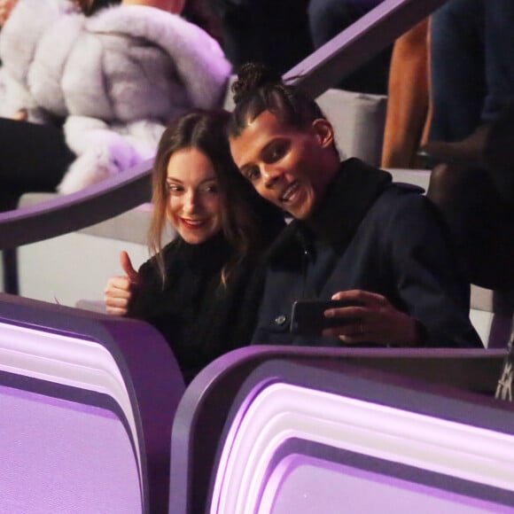 Stromae (nouvelle coupe de cheveux) et sa femme Coralie Barbier au défilé "Victoria's Secret Paris 2016" au Grand Palais à Paris, le 30 novembre 2016. © Denis Guignebourg/Bestimage