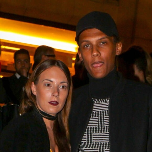 Le chanteur Stromae et sa femme Coralie Barbier - Défilé de mode "Kenzo" collection prêt-à-porter Printemps-Eté 2017 lors de la Fashion Week de Paris à la Cité de l'architecture et du patrimoine au Trocadéro à Paris, France, le 4 octobre 2016. © Agence/Bestimage