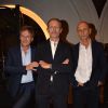 Lambert Wilson entouré de Patrick Rizzo et Patrick Joly, fondateurs et directeurs des clubs de sport L'Usine, lors de la soirée d'inauguration de la nouvelle salle de l'enseigne à Saint-Lazare à Paris le 14 octobre 2019.