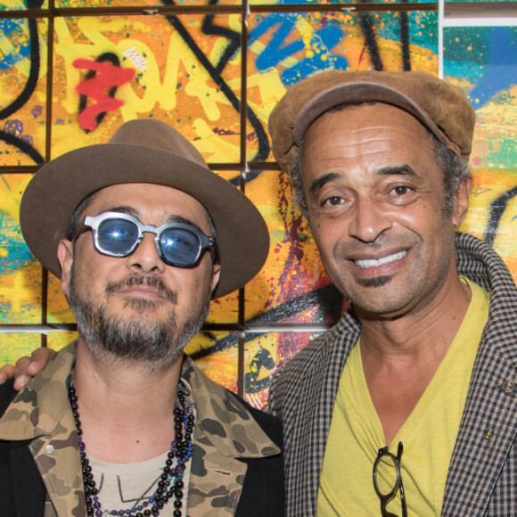 L'artiste Kongo (Cyril Phan) et Yannick Noah - Vernissage de l'exposition de l'artiste l'artiste Kongo (Cyril Phan) au Montaigne Market à Paris le 17 octobre 2019. © Jerémy Melloul/ Bestimage