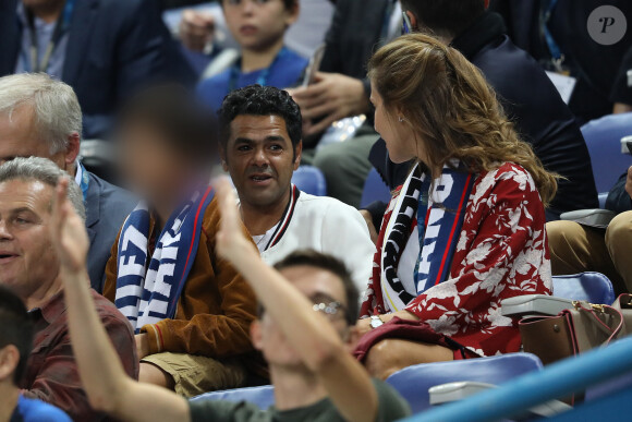 Jamel Debbouze, sa femme Mélissa Theuriau et leur fils Léon dans les tribunes du stade de France lors du match de ligue des nations opposant la France à l'Allemagne à Saint-Denis, Seine Saint-Denis, France, le 16 octobre 2018. La France a gagné 2-1.