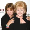Archives - Carrie Fisher et sa mère Debbie Reynolds au photocall de "Life Benefit" le 19 août 2003.