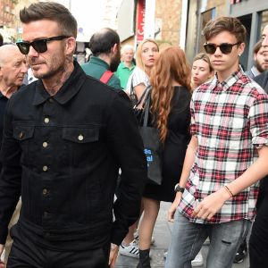 David Beckham et son fils Romeo lors d'une sortie père fils à Milan le 19 juin 2019.