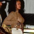 Exclusif - Rihanna porte un ensemble or très glamour alors qu'elle arrive au restaurant italien Giorgio Baldi. La star est entrée par la porte de la cuisine située à l'arrière du restaurant. Rihanna est arrivée après la fermeture des lieux avec quelques amis, ils ont pu profiter du restaurant privatisé pour la soirée. Santa Monica, le 24 octobre 2019.