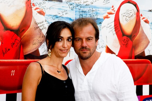 Stéphane Henon et sa femme Isabelle - Avant-première du film "Fiston" lors du 11ème festival "Les Hérault du cinéma et de la télé 2014" au Cap d'Agde, le 28 juin 2014.