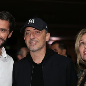 Tony Estanguet, Gad Elmaleh, Anne Marivin lors de la présentation du logo des Jeux Olympiques et Paralympiques "Paris 2024" dévoilé au cinéma "Le Grand Rex" à Paris, le 21 octobre 2019.