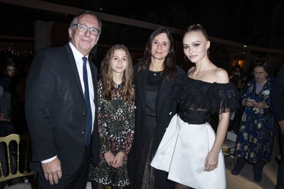 Bruno Pavlovsky (PDG de Chanel), son épouse, leur fille et Lily-Rose Depp assistent au défilé Chanel Métiers d'Art 2019/2020 au Grand Palais. Paris, le 4 décembre 2019 © Olivier Borde / Bestimage