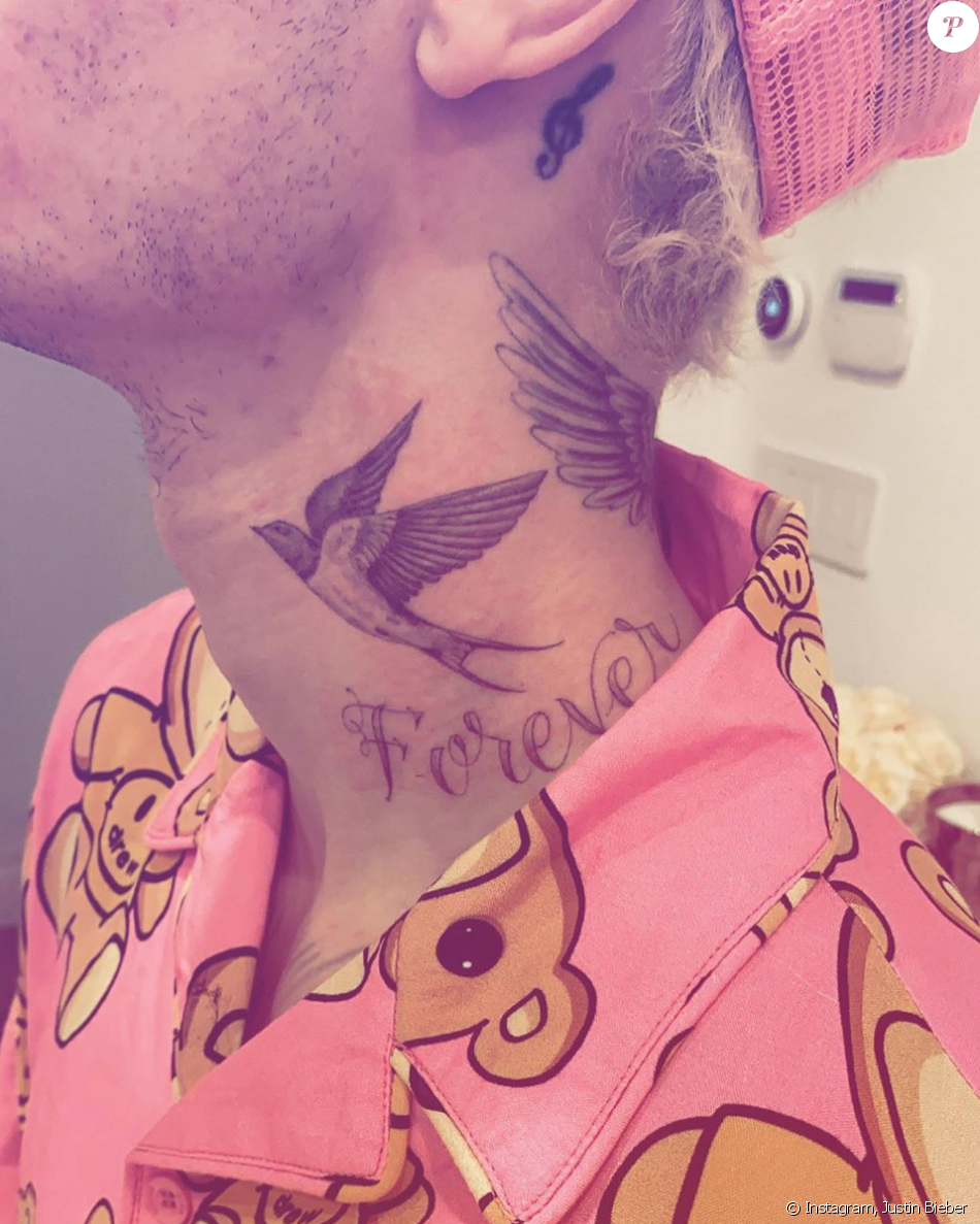 Justin Bieber Sest Fait Tatouer Deux Oiseaux Et Le Mot