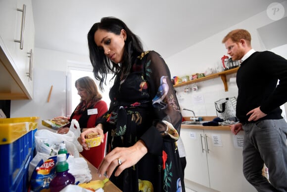 Le prince Harry, duc de Sussex, et Meghan Markle, duchesse de Sussex, enceinte visitent le centre One25 une organisation caritative spécialisée dans l'aide aux femmes prostituées. Bristol le 1er février, 2019