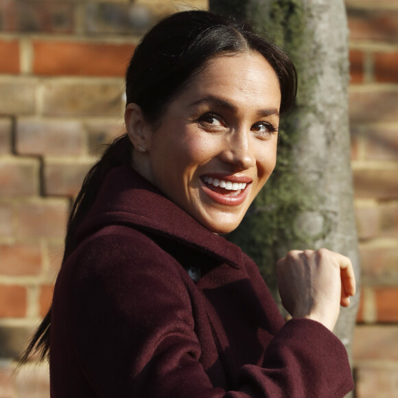 Meghan Markle (enceinte), duchesse de Sussex, rend visite à la Hubb Community Kitchen à Londres le 21 novembre 2018.