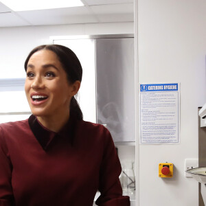 La duchesse de Sussex, Meghan Markle, enceinte, rend visite à la Hubb Community Kitchen à Londres le 21 novembre 2018.