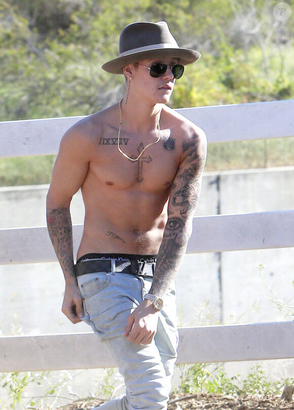 Justin Bieber fait du cheval au Griffith Park à Los Angeles, le 12 mai 2014.
