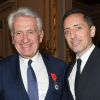 Gilbert Coullier et Gad Elmaleh - Gilbert Coullier reçoit l'insigne "Officier de la Légion d'honneur" par le général Benoît Puga au palais de la Légion d'honneur à Paris, le 9 décembre 2019. © Coadic Guirec/Bestimage