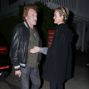 Johnny Hallyday et sa femme Laeticia Hallyday vont diner au restaurent Giorgio Baldi a Los Angeles, le 1er decembre 2013.