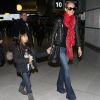 Laeticia Hallyday avec ses filles Jade et Joy et Elyette sa grand-mere - Johnny Hallyday quitte Paris en famille pour Los Angeles le 12 janvier 2014.