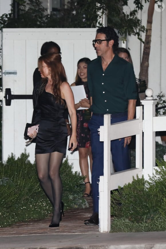 Exclusif - Isla Fisher et son compagnon Sacha Baron Cohen arrivent pour un dîner à West Hollywood, le 21 septembre 2019 West Hollywood.