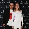 Adrien Erka et Carla Ginola assistent à la soirée "Hublot Loves Art" organisée par Hublot, à la Fondation Louis Vuitton. Paris, le 16 décembre 2019.