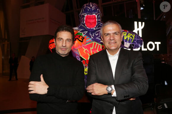 Richard Orlinski et Ricardo Guadalupe assistent à la soirée "Hublot Loves Art" organisée par Hublot, à la Fondation Louis Vuitton. Paris, le 16 décembre 2019.