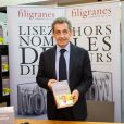 Nicolas Sarkozy dédicace son livre "Passions" à la librairie Filigranes à Bruxelles le 18 octobre 2019.