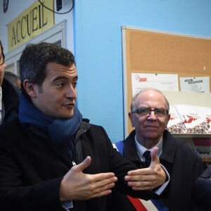 Le président de la République Emmanuel Macron et le ministre de l'Action et des Comptes Publics, Gérald Darmanin, (ancien maire de Tourcoing) au centre social de la Bourgogne, quartier en difficultés de Tourcoing, France, le 14 novembre 2017. © François Lo Presti/Pool/Bestimage