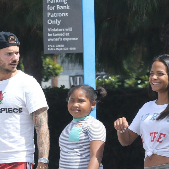 M. Pokora, sa compagne Christina Milian enceinte et sa fille Violet Nash - Enceinte et radieuse, Christina Milian se rend au glacier McConnell avec compagnon M.Pokora et sa fille Violet Nash pour le goûter après avoir acheté des vêtements pour bébés. Le 3 août 2019.