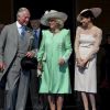 Le prince Charles, prince de Galles, Camilla Parker Bowles, duchesse de Cornouailles, Meghan Markle, duchesse de Sussex lors de la garden party pour les 70 ans du prince Charles au palais de Buckingham à Londres. Le 22 mai 2018