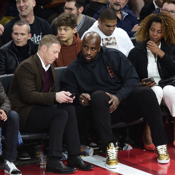 Teddy Riner et sa compagne Luthna Plocus assistent au NBA Game Paris 2020 opposant les Milwaukee Bucks et les Charlotte Hornets à l'AccorHotels Arena. Paris, le 24 janvier 2020. © JB Autissier / Panoramic / Bestimage