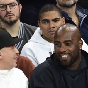 DJ Cut Killer, Teddy Riner et sa compagne Luthna Plocus assistent au NBA Game Paris 2020 opposant les Milwaukee Bucks et les Charlotte Hornets à l'AccorHotels Arena. Paris, le 24 janvier 2020. © JB Autissier / Panoramic / Bestimage