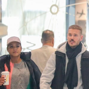 Exclusif - M. Pokora et sa compagne Christina Milian (enceinte) prennent un vol pour Genève à l'aéroport Roissy CDG le 13 novembre 2019.