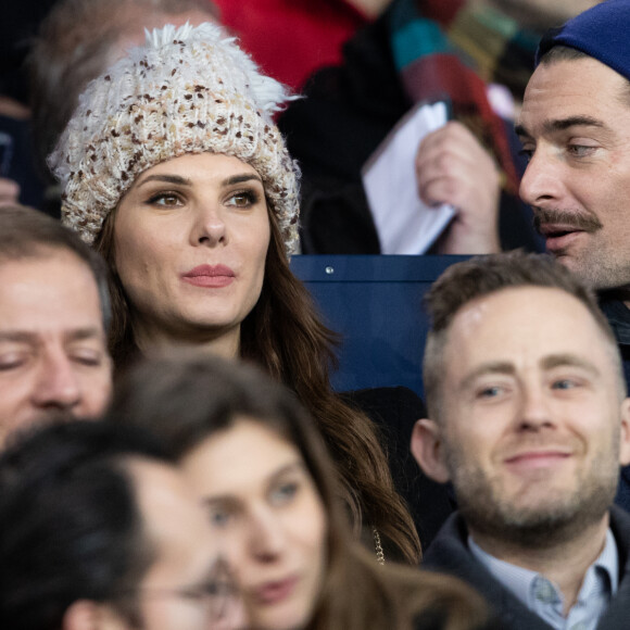 Camille Lacourt et sa compagne Alice Detollenaere (Miss Bourgogne 2010) dans les tribunes lors du match de championnat de Ligue 1 Conforama opposant le Paris Saint-Germain (PSG) aux Girondins de Bordeaux au Parc des Princes à Paris, France, le 23 février 2020. Le PSG a gagné 4-3. © Cyril Moreau/Bestimage