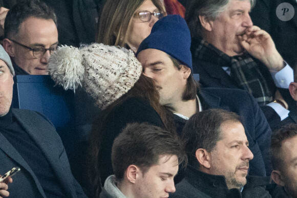 Camille Lacourt et sa compagne Alice Detollenaere (Miss Bourgogne 2010) dans les tribunes lors du match de championnat de Ligue 1 Conforama opposant le Paris Saint-Germain (PSG) aux Girondins de Bordeaux au Parc des Princes à Paris, France, le 23 février 2020. Le PSG a gagné 4-3. © Cyril Moreau/Bestimage