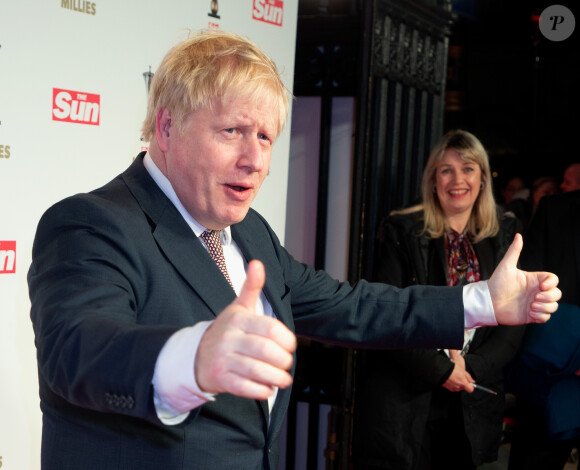Le Premier ministre Boris Johnson au photocall de la soirée des Sun Military Awards au Banqueting House à Londres, Royaume Uni, le 6 février 2020.