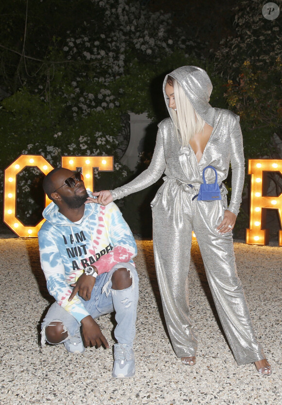 Le rappeur Gims (Maître Gims - Gandhi Djuna) et sa femme Demdem Djuna lors de la soirée de lancement de la collection capsule "I'm not a rapper" de la marque Elevenparis (Eleven Paris) à Paris, France, le 11 avril 2019. © Christophe Aubert via Bestimage