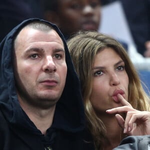 Michaël Youn et sa compagne Isabelle Funaro - People à la finale de la Coupe de la Ligue entre le Psg et Bastia au Stade de France à Saint-Denis le 11 avril 2015. Le psg a remporté le titre sur le score de 4 à 0.11/04/2015 - Saint Denis