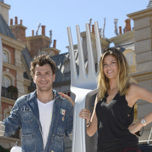 Michaël Youn et sa femme Isabelle Funaro lors de la présentation en avant-première de la nouvelle attraction "Ratatouille : L'aventure totalement toquée" à Disneyland Paris à Marne-la-Vallée, le 21 juin 2014.21/06/2014 - Marne-la-Vallée