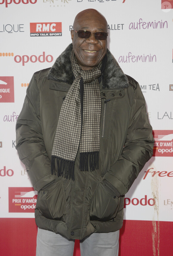 Manu Dibango - Le 94e Prix d'Amérique Opodo à l'Hippodrome de Paris-Vincennes, le 25 janvier 2015.