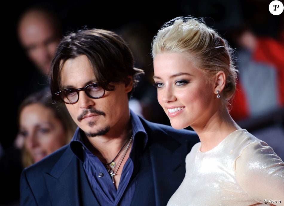 Johnny Depp et Amber Heard arrivent à la première ...