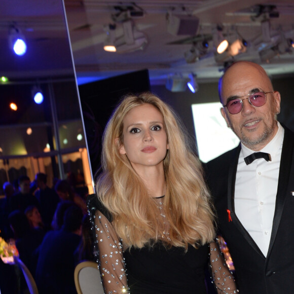 Pascal Obispo et sa femme Julie Hantson à la 17ème édition du "Dîner de la mode du Sidaction" au Pavillon d'Armenonville à Paris, France, le 24 janvier 2019. © Rachid Bellak/Bestimage