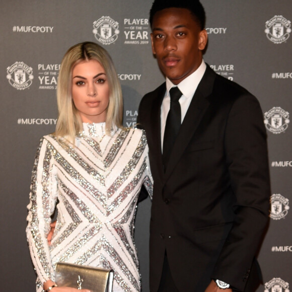 Anthony Martial et sa femme Mélanie Da Cruz lors de la soirée du prix du joueur de l'année de Manchester United 2019 au stade Old Trafford à Manchester, Royaume Uni, le 9 mai 2019.