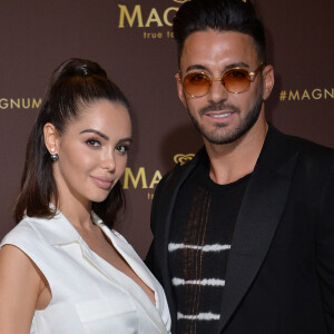 Nabilla Benattia (enceinte) et son mari Thomas Vergara au photocall de l'after party "Magnum x Rita Ora" sur la plage privée Magnum lors du 72ème Festival International du Film de Cannes, France,le 16 mai 2019. © Veeren/Bestimage