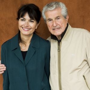 Claude Lelouch et sa femme Valérie Perrin au village des internationaux de France de tennis de Roland Garros 2019 à Paris le 7 juin 2019. © JB Autissier / Panoramic / Bestimage