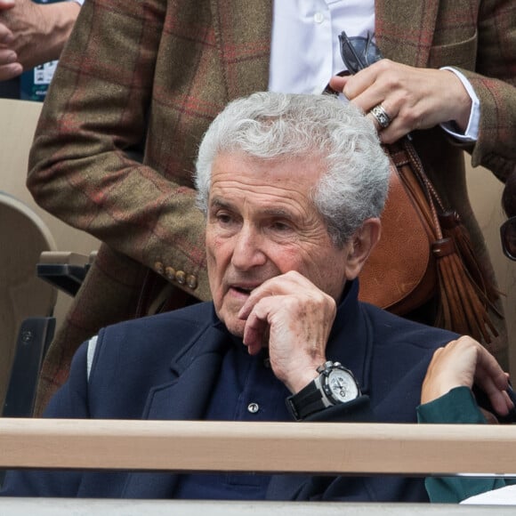 Claude Lelouch et sa compagne Valérie Perrin - People dans les tribunes lors des internationaux de France de tennis de Roland Garros 2019 à Paris le 28 mai 2019. © Jacovides-Moreau/Bestimage