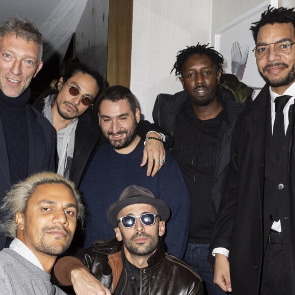 Vincent Cassel, Toumani Sangaré, Kim Chapiron, Mouloud Achour, JR (Artiste), Ladj Ly, Olivier Bassuet lors de la remise de la médaille d'Officier des Arts et des Lettres au rappeur O.Puccino par l'acteur, réalisateur et producteur V.Cassel à l'hôtel du Collectionneur à Paris, France, le 2 mars 2020. © Jack Tribeca/Bestimage