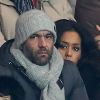 Exclusif - Amel Bent et son compagnon Patrick assistent au match de Ligue des Champions PSG - Olympiakos Le Pirée au Parc des Princes à Paris le 27 novembre 2013.