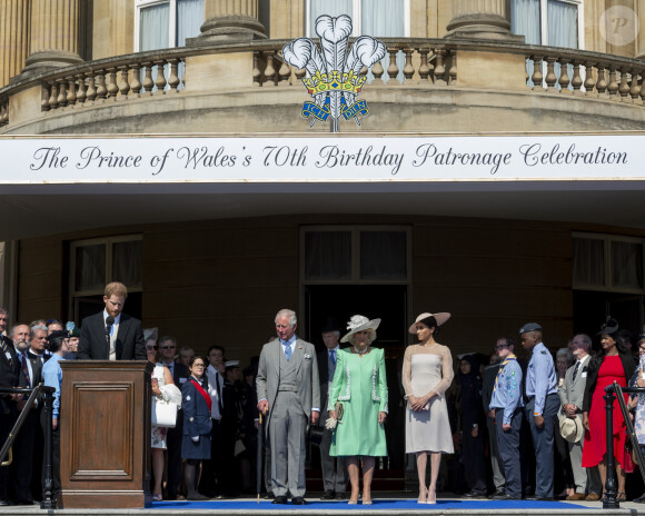 Le prince Harry, duc de Sussex, le prince Charles, prince de Galles, Camilla Parker Bowles, duchesse de Cornouailles, Meghan Markle, duchesse de Sussex lors de la garden party pour les 70 ans du prince Charles au palais de Buckingham à Londres. Le 22 mai 2018