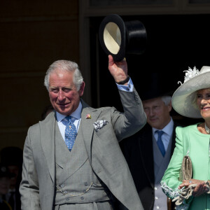 Le prince Charles, prince de Galles, Camilla Parker Bowles, duchesse de Cornouailles, Meghan Markle, duchesse de Sussex lors de la garden party pour les 70 ans du prince Charles au palais de Buckingham à Londres. Le 22 mai 2018