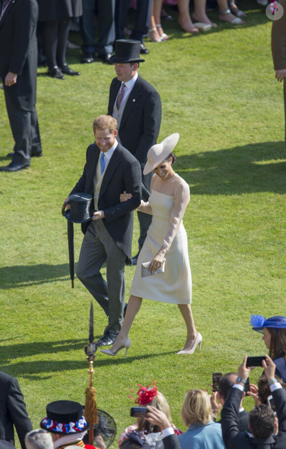 Le prince Harry, duc de Sussex et Meghan Markle, duchesse de Sussex lors de la garden party pour les 70 ans du prince Charles au palais de Buckingham à Londres le 22 mai 2018.