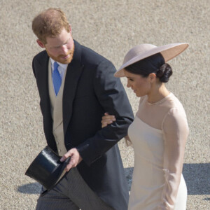 Le prince Harry, duc de Sussex et Meghan Markle, duchesse de Sussex lors de la garden party pour les 70 ans du prince Charles au palais de Buckingham à Londres le 22 mai 2018.